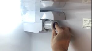 Unplug the Whirlpool refrigerator